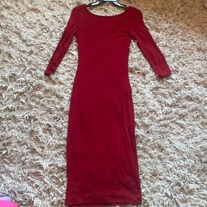 Red Lulu’s quarter length sleeve and mid knee dress with low-cut back
